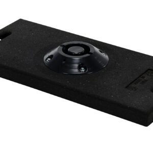 The Vestil Recycled Rubber Large Base W/Handle is a black, rectangular rubber base with rounded corners and a circular central component. It has handles on two sides and a textured surface, ideal for mounting or stability purposes.