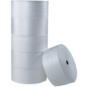 Two large MH-USA 1/4 x 24 x 250 Air Foam Rolls, one upright and one leaning horizontally, feature a smooth texture ideal for packing and protecting items due to their durable design.