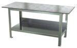 The Vestil Fixture Welding Table, .75 Thick Top, 30 X 72, boasts a smooth stainless steel surface and sturdy legs. Its full-length lower shelf provides ample workspace and storage, ensuring versatility in any setting.