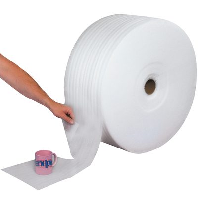 FWUPS18S24P.jpg A hand unwinds a large roll of MH-USA 1/8 x 24 x 350 Parcel Ready Perforated Air Foam Roll (350/Roll) to wrap a pink mug with text, offering crucial protective packaging.