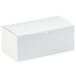A plain white rectangular cardboard box, part of the MH-USA 10 x 5 x 4 White Gift Boxes (100/Case), is shown with a closed lid from a slight angle against a pristine white background, making it an elegant choice for any occasion.