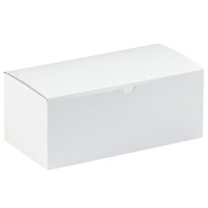 A plain white rectangular cardboard box, part of the MH-USA 10 x 5 x 4 White Gift Boxes (100/Case), is shown with a closed lid from a slight angle against a pristine white background, making it an elegant choice for any occasion.