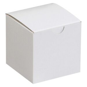 The MH-USA 3 x 3 x 3 White Gift Boxes feature a curved lid and semicircular front notch, perfect for small gifts. Sold in cases of 100, these boxes add an elegant touch to any presentation.