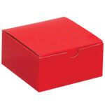 An MH-USA 4 x 4 x 2 holiday red gift box, closed with a small notch on the front edge, sits elegantly against a plain white background.