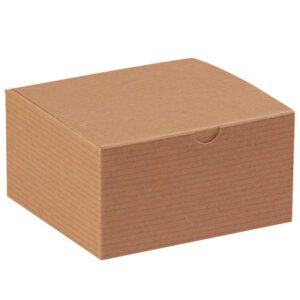 A 5 x 5 x 3 closed, plain brown Kraft Gift Box from our 100/Case collection sits against a white background with a tuck-in flap, appearing sturdy and perfect for packaging or storage needs.
