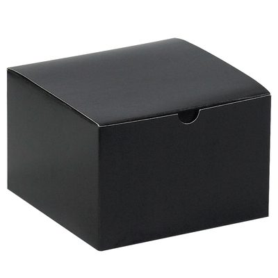GB664BK.jpg A rectangular black cardboard box with a closed lid has a small semicircular cutout on the front edge for easy opening. It features a smooth matte surface, resembling the sleek design of the MH-USA 6 x 6 x 4 Black Gloss Gift Boxes (100/Case).