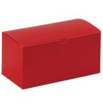 The MH-USA 9 x 4 1/2 x 4 1/2 Holiday Red Gift Boxes (100/Case) feature a smooth red design with a slightly rounded top and an easy-open front flap, ideal for gifts. The closed box stands out against a white background as part of a special holiday collection.
