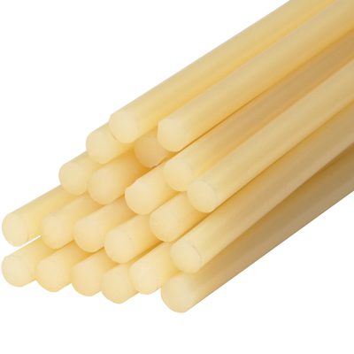 GL4005.jpg A case of MH-USA 1/2 x 15 Light Amber Glue Sticks (60/Case) is neatly arranged, each translucent cylindrical stick adding elegance against the plain white background.
