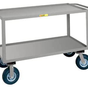 The Little Giant Flush-Handle Instrument Cart is a two-tier, gray, rectangular metal cart with a sturdy frame and four large rubber wheels. Its perfect for heavy-duty use in warehouses or workshops.