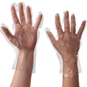 Two hands wearing MH-USA Clear Poly Gloves 1 Mil (1000/Case), fingers spread, display slightly wrinkled transparent gloves against a plain white background, revealing the skin beneath.