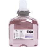 A clear rectangular bottle of GOJO® Premium Foaming Soap with light purple liquid, featuring a gray pump top and a label with the brand name, recycling symbol, and 1,200 mL size. Its compatible with 200 mL refills available in cases of two.