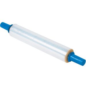 A roll of 20 x 80 Gauge x 1000 Goodwrappers® Economy Cast Stretch Wrap is displayed horizontally with blue handles for easy grip and dispensing, wound tightly around a cylindrical core and reflecting light beautifully on its shiny surface.