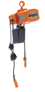 The Vestil Econ Chain Hoist W/ Container 1K 3 Phase includes a strong hook, control pendant, power cord, and is suspended. The model has a label showing its efficient lifting capacity of 1,000 kg.