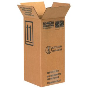 Tall brown cardboard shipping box with open flaps, designed for MH-USA 6 x 6 x 12 3/4 Haz Mat Boxes (20/Bundle). It has upright arrows and labels compliant with air, sea, and ground transport regulations.