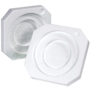 Two white, octagonal plastic caps with embossed text like Norwax International and Seal Side are designed to fit the MH-USA 1 Gallon Paint Can Foam Insert (100/Case) perfectly. They feature a central circular indentation and are displayed facing upward.