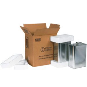 An open cardboard shipping box with foam packaging inserts and two metal containers is part of the MH-USA 11 3/8 x 8 3/16 x 12 3/8 2 - 1 Gallon F-Style Shipper Kit (45/Skid), showcasing secure transit packaging.