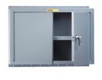 The Little Giant Heavy-Duty Welded Steel Wall Storage Cabinet is a gray, rectangular unit with a slightly ajar door revealing an interior shelf. It has a key lock on the handle and displays a yellow label at the top.