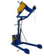 The blue and yellow Vestil Hyd Drum Carrier/Rotator/Boom Dc 71.2 In is an industrial drum lifter with a chain and lever for holding and tilting large barrels, featuring a sturdy base and hydraulic components for reliable lifting and tilting.