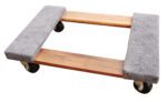 The Vestil Carpet End Hardwood Dolly 0.9Klb 16 x 24 has four black wheels, two gray-carpeted platforms, and a light brown wood design, combining durability with functionality for gentle transport.