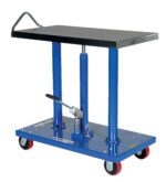 The Vestil Hydraulic Post Table 1K Lb 20 X 36 features a flat, blue metal top on two vertical columns and includes a black handle. It has a rectangular base with four red caster wheels and adjustable height via foot pedal.