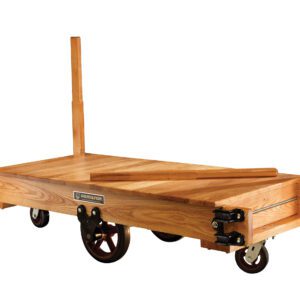 The Vestil Wood Platform Tilting Truck 60 x 36 is a sturdy moving dolly with a rectangular platform, four large black wheels, and tall wooden posts at each corner for smooth transport. The brand name Promountings is prominently displayed on the side.