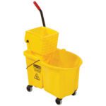 The Rubbermaid® WaveBrake® Side Press, 44 Quart Yellow Bucket/Wringer, features a built-in wringer, black wheels, a red handle, and a caution symbol for efficient cleaning.