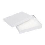 An open MH-USA 6 x 5 x 1 White Jewelry Box, slightly angled, displays a soft white cotton layer inside, ideal for showcasing treasures. The simple white background highlights the boxs elegant simplicity.