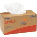 A brown dispenser box of Kimberly Clark® WypALL® L40 10.8 x 10 All Purpose Wipers, featuring red text and the blue number 03046, has an opening for easy wipe access, with a drawing illustrating hand use. Ideal for various tasks, it contains white wipes ready to be used (810/Case).