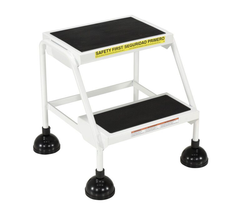 A two-step metal stool with black non-slip treads and rubber suction feet, similar to the Vestil Spring Loaded Roll Ladder 2 Step White, features a yellow Safety First label on the top edge. Its predominantly white structure ensures maximum stability and safety.