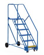 The Vestil Warehouse Ladder 50 Deg Grip 6 Stp 21 In features blue rolling construction, six metal steps, safety rails, and a yellow-highlighted bottom step for visibility. Its design includes wheels for mobility on a plain white background, making it ideal for versatile use.