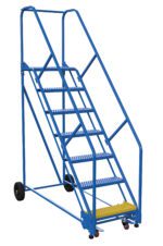 The Vestil Warehouse Ladder 50 Deg Grip 7 Stp 14 In is a blue rolling metal ladder with seven steps, handrails on both sides, wheels for easy movement, and a slip-resistant yellow surface on the bottom step for safety at a 50-degree angle.