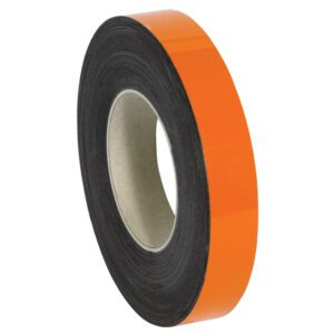 A roll of MH-USA 1 x 50 orange warehouse labels with a magnetic black edge, partially unwound. Set against a white background, it displays its cylindrical shape and inner cardboard core.