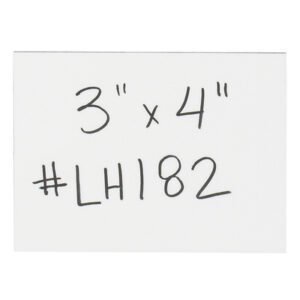 A white card shows handwritten text: 3 x 4 and #LH182 in black ink, resembling MH-USA 3 x 4 White Warehouse Labels - Magnetic Strips (25/Case).