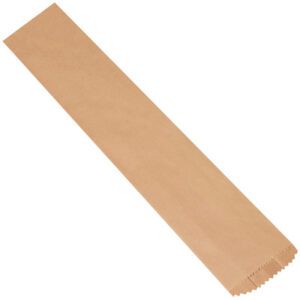 This empty 6 x 3 1/2 x 34 Kraft Bag from a case of 100 is displayed on a white backdrop, showcasing its long, narrow, rectangular design with a light brown color and serrated edge.