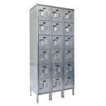 A set of three connected Vestil Locker-Ss 6 Row 3 Column units, featuring five vertical compartments each, with a gray metallic finish, vented doors, and small handles. Measuring 36 x 18 x 78 inches, they provide practical storage in a sleek design.