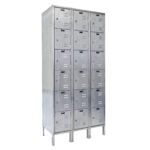 The Vestil Locker-Ss 6 Row 3 Column features three connected metal lockers, each with four compartments. These sleek silver lockers, sized at 54 x 18 x 78 inches, come with ventilation slots and keyholes on each door.