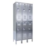 A set of six silver metal lockers, similar to the Vestil Locker-Ss 2 Row 3 Column 54 X 18 X 78 model, featuring handles and ventilation slots on four sturdy legs.