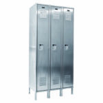 The Vestil Locker-Ss 1 Row 3 Column 54 X 18 X 78 features three silver metal lockers with vented doors, built-in handles, and raised legs.