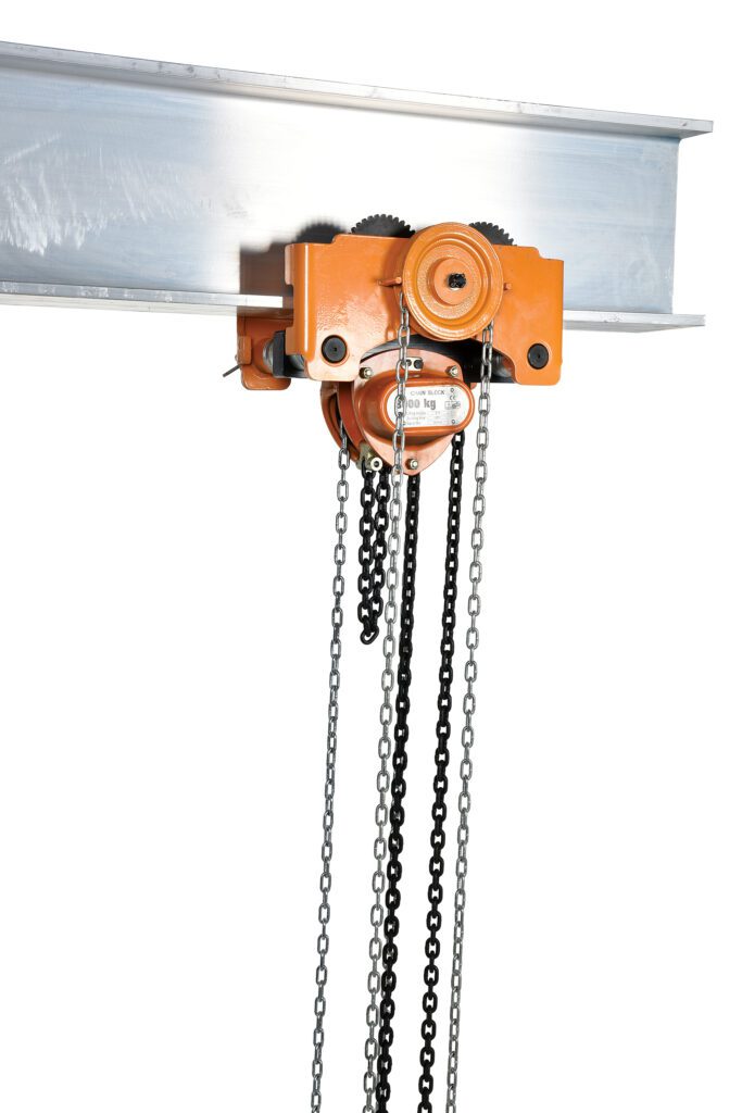 The Vestil Low Headroom Chain Hoist Trolley Gear 6K is mounted on a horizontal metal beam, featuring a black and silver chain system. Its vibrant orange design includes clear labeling and adjustment mechanisms for efficient control and enhanced safety with a 6K capacity.