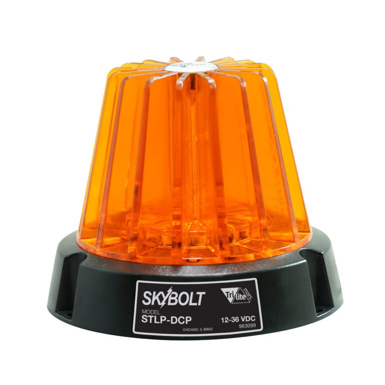 The Vestil Light features an amber, round 4 dome with a black base, labeled Skybolt Model STLP-DCP, supporting 12-36 VDC. With its textured surface, this flashing safety light serves as a warning or signaling device.