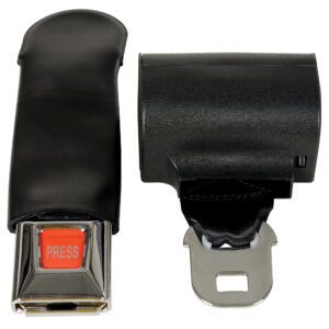 The image displays a black seatbelt buckle and latch from the Vestil Truck Seat Option - Safety Belt, featuring a red PRESS button and a metal tab on the latch for secure fastening.