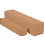 Two brown rectangular cardboard boxes, differing in size, rest on a white background. Nearby, a bundle of 3 x 3 x 18 Kraft Square Mailing Tubes (25/Bundle) enhances the minimalist scene with their unmarked surfaces and visible edges.