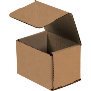 A 4 x 3 x 3 Kraft Corrugated Mailer with one flap raised, empty and made from brown corrugated material, sits against a plain white background. Sold in bundles of 50 for convenience.