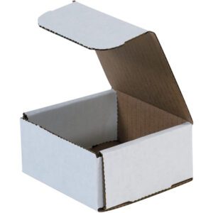 The MH-USA 4 x 4 x 2 white corrugated mailer opens to show a plain brown interior, with its tilt revealing the straightforward texture and design typical of such packaging—ideal for those seeking simplicity in every bundle of 50.