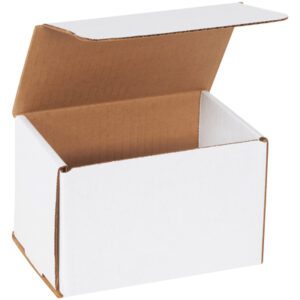 An MH-USA 6 x 4 x 4 white corrugated mailer with extended flaps displays its simple structure, revealing the empty brown interior.