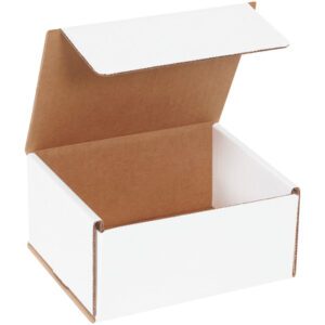 The MH-USA 6 x 5 x 3 White Corrugated Mailers, bundled in sets of 50, feature a sturdy build and brown interior. Perfect for your shipping needs, one sits on a simple white surface with its lid partially raised to showcase its spacious interior.