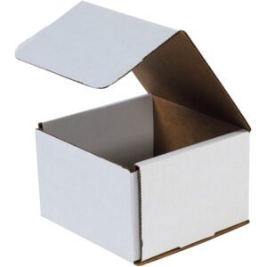 The MH-USA 6 x 6 x 4 white corrugated mailer, with its brown interior partially visible, showcases its cubic shape and minimalist design ideal for efficient bundling. Comes in a set of 50 per bundle.