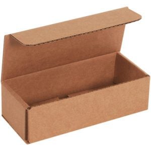 A brown rectangular cardboard 7 x 3 x 2 Kraft Corrugated Mailer with an open lid shows its empty interior, set against a plain white background. It is available in bundles of 50.