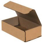 A brown cardboard box with an open lid showcases its empty interior. This 7 x 4 x 2 Kraft Corrugated Mailer, offered in bundles of 50, is crafted for efficient packaging and shipping with clean edges and a perfect rectangular shape.