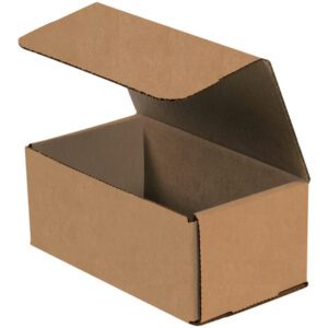 An open 7 x 4 x 3 Kraft Corrugated Mailer, made of durable material, lies at an angle on a plain white background with its lid partially lifted to reveal its empty interior. (50/Bundle).